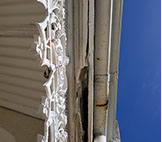 Rotten fasia and rusty gutters