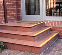 Stairs with tiles before removal