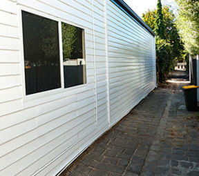 Repainted weatherboard wall